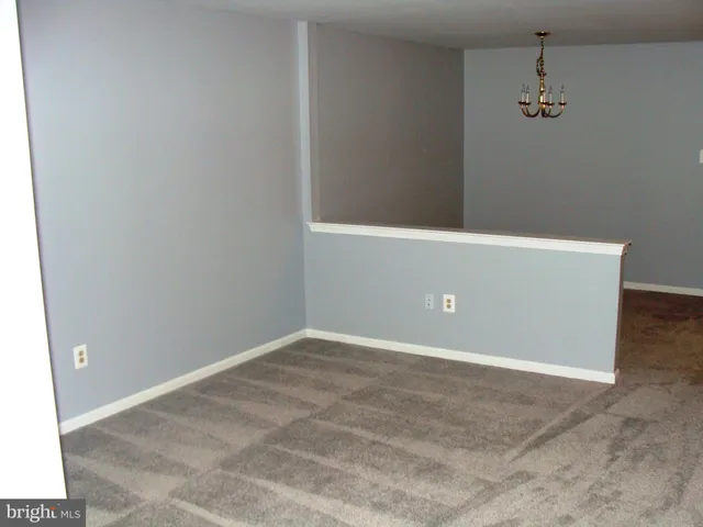 a bathroom with a sink toilet and a mirror