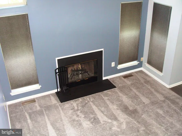 a kitchen that has a sink and a stove