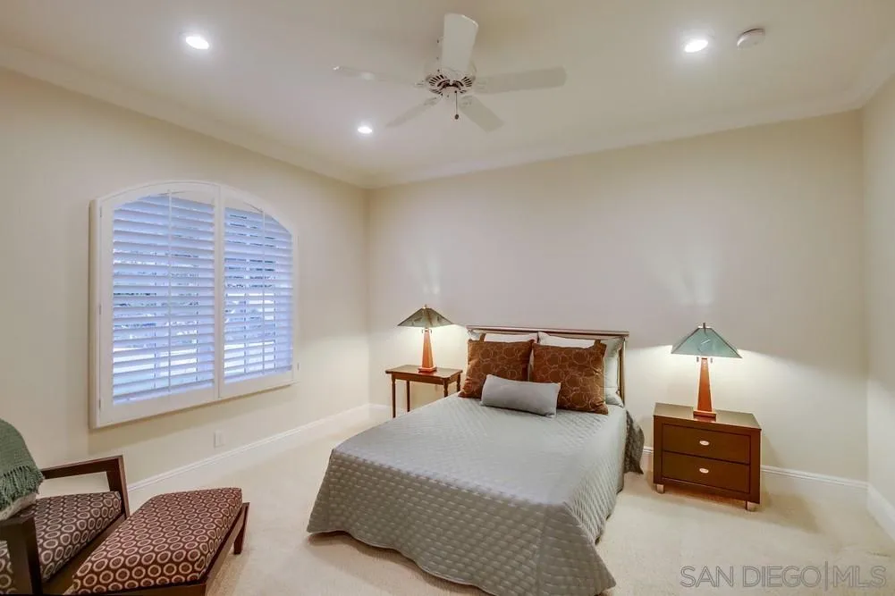 6867 Poco Lago Rancho Santa Fe, CA 92067 - Photo 42 of 52 a bedroom with a bed and window