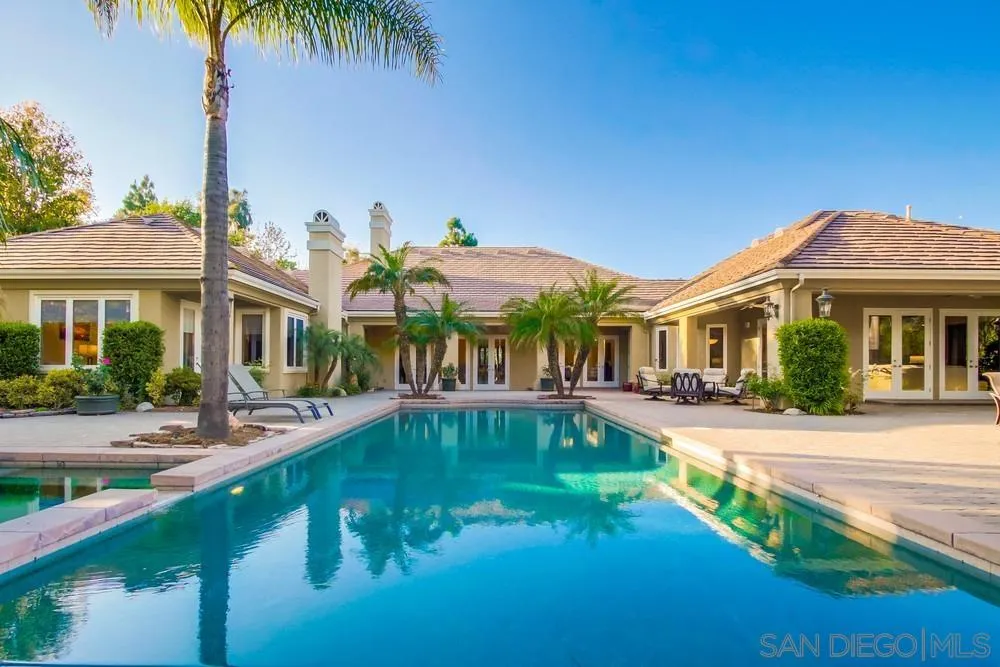 6867 Poco Lago Rancho Santa Fe, CA 92067 - Photo 50 of 52 a front view of house with yard and outdoor seating