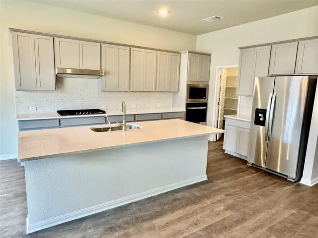 $399,990 | 574 Banff Drive, Kyle, TX 78640