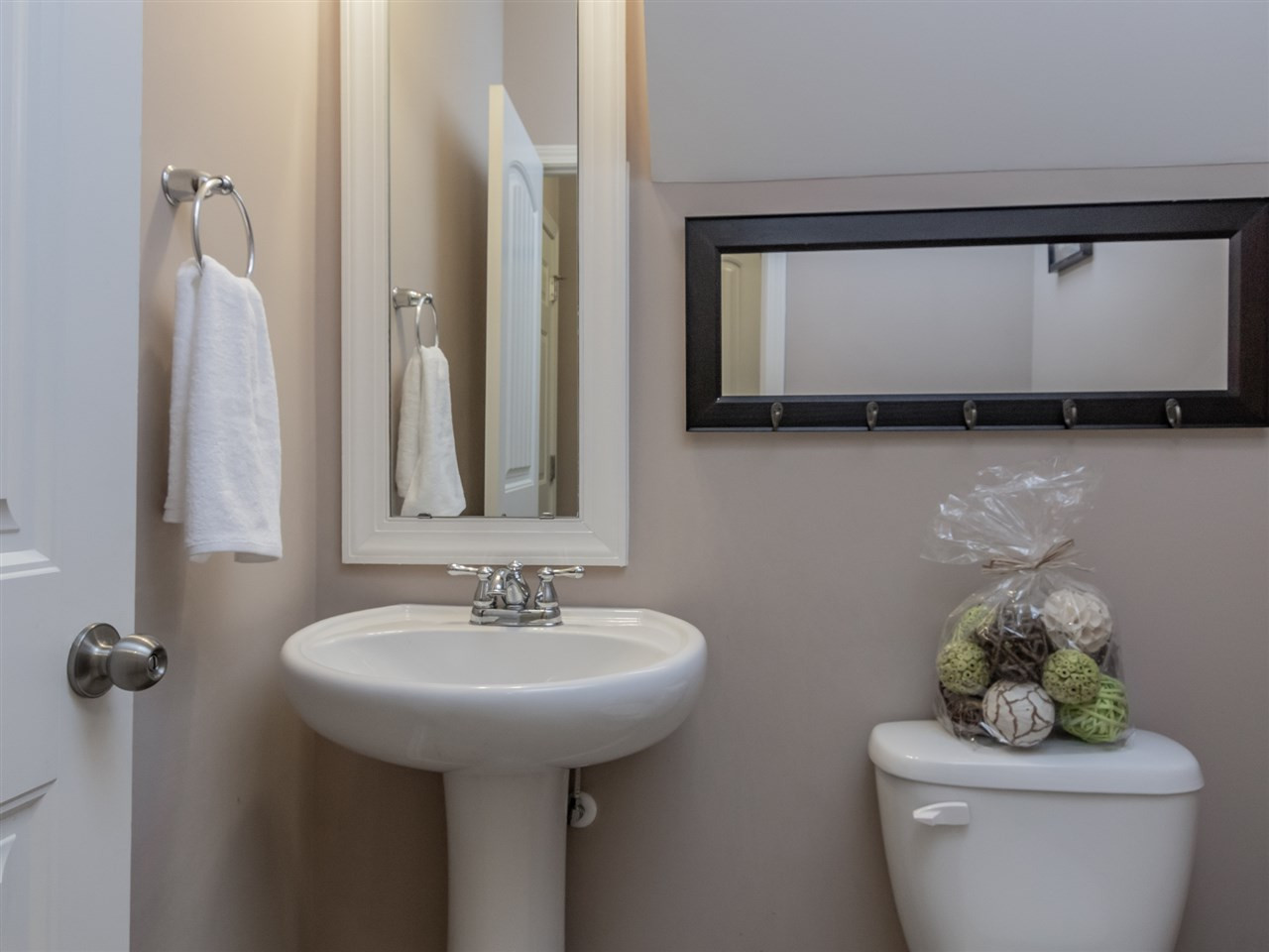 604 Smith Ridge Way Fuquay-Varina, NC 27526 - Photo 18 of 30 Hall bath located off the kitchen and garage and adjacent to a large closet. Use as a perfect drop zone location! Half bath