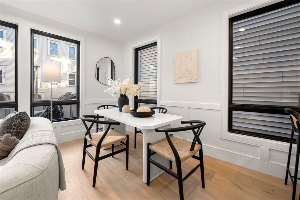 136 West 8th Street, Unit 2 Boston, MA 02127 - Photo 4 of 14 a workspace with furniture and window