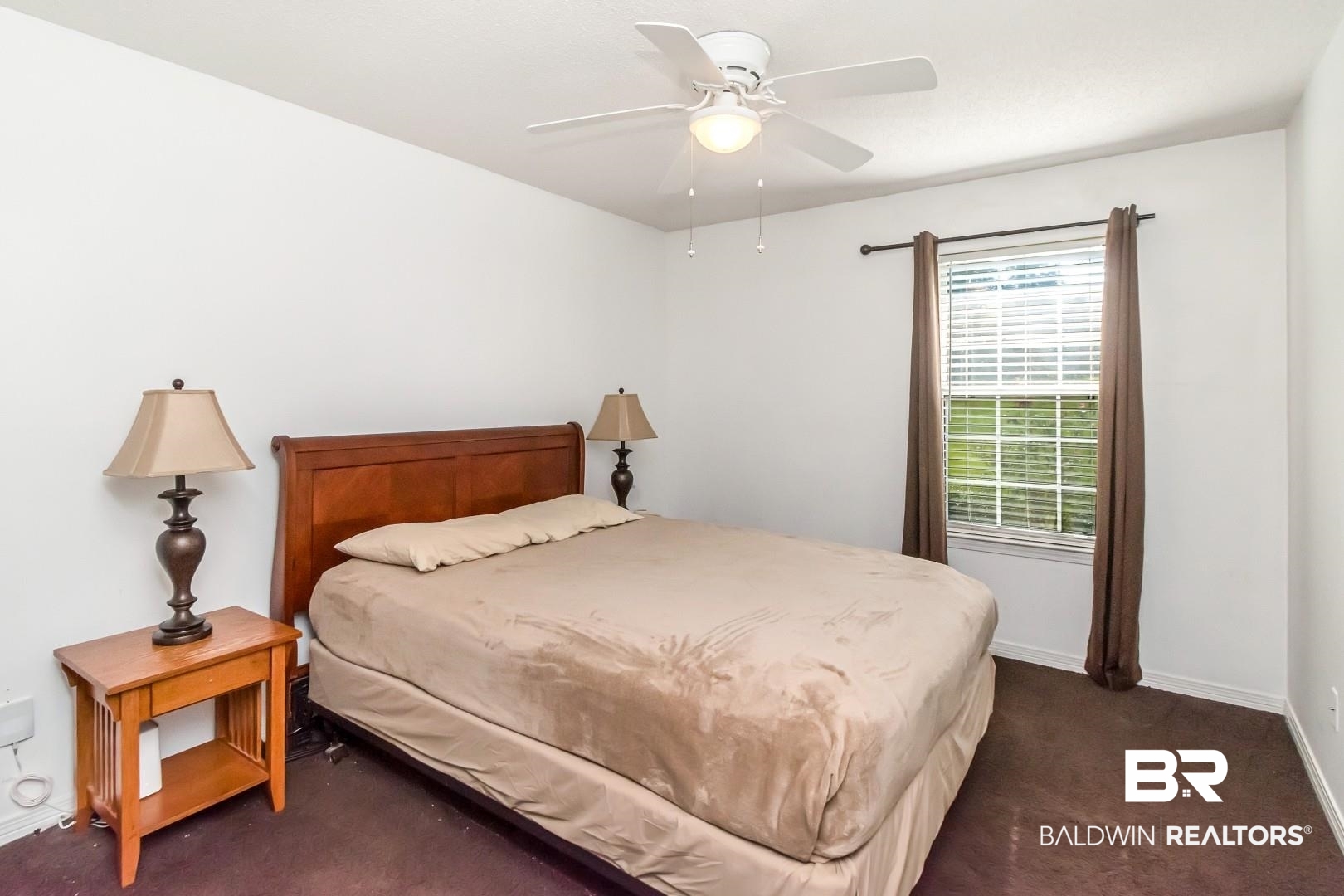 1345 Camden Court Mobile, AL 36695 - Photo 13 of 31 Bedroom featuring dark carpet and ceiling fan
