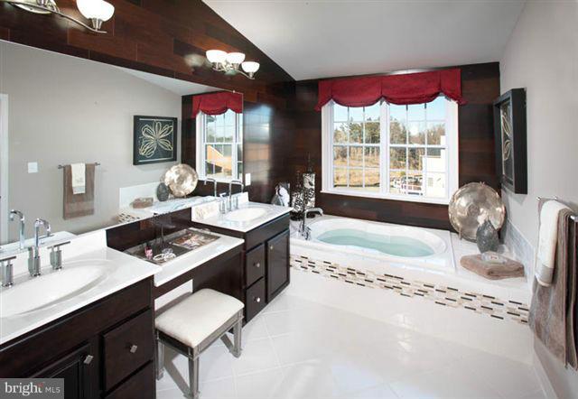 4506 Grazing Way Upper Marlboro, MD 20772 - Photo 5 of 12 a living room with hard wood floors and a large window