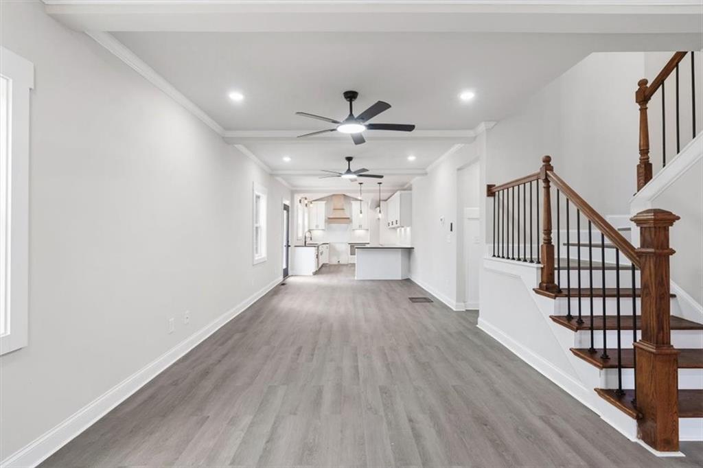 285 3rd Street East Fruithurst, AL 36262 - Photo 13 of 53 wooden floor in an empty room with a window