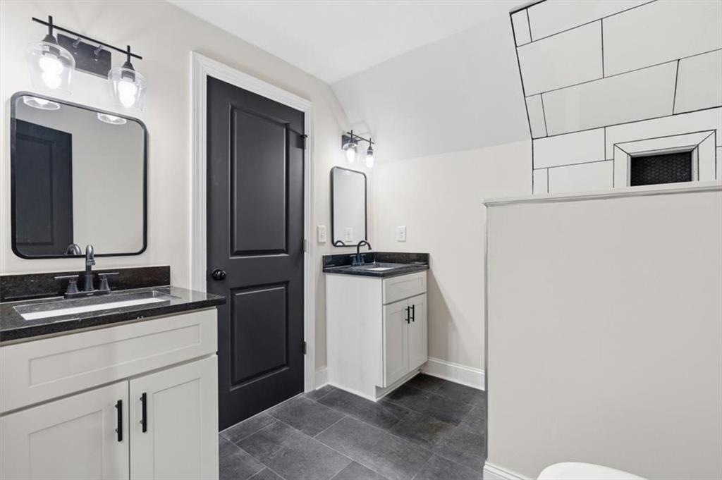 285 3rd Street East Fruithurst, AL 36262 - Photo 35 of 53 a bathroom with a sink and a mirror