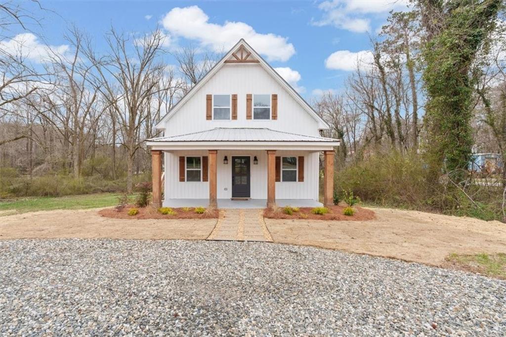 285 3rd Street East Fruithurst, AL 36262 - Photo 4 of 53 a front view of a house with a yard