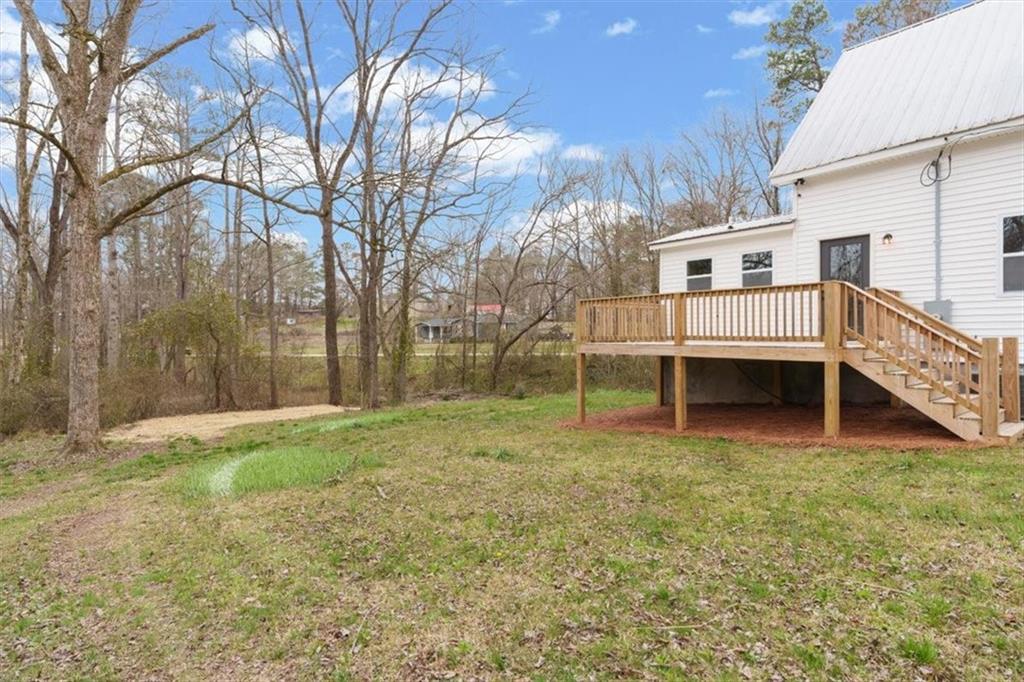 285 3rd Street East Fruithurst, AL 36262 - Photo 44 of 53 a view of a house with a yard and a tree