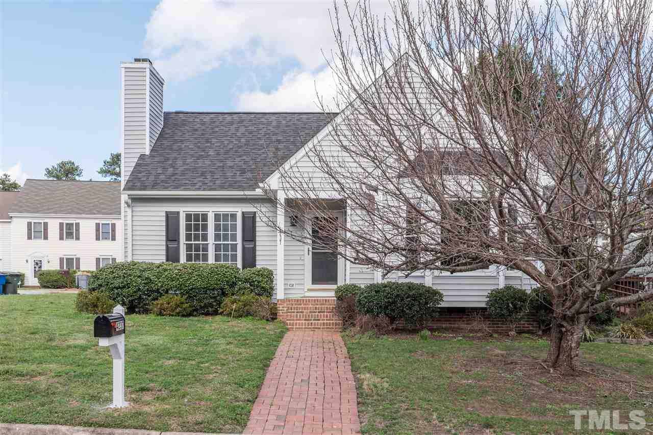 4237 Dinwiddie Court Raleigh, NC 27604 - Photo 1 of 25 a front view of a house with a yard