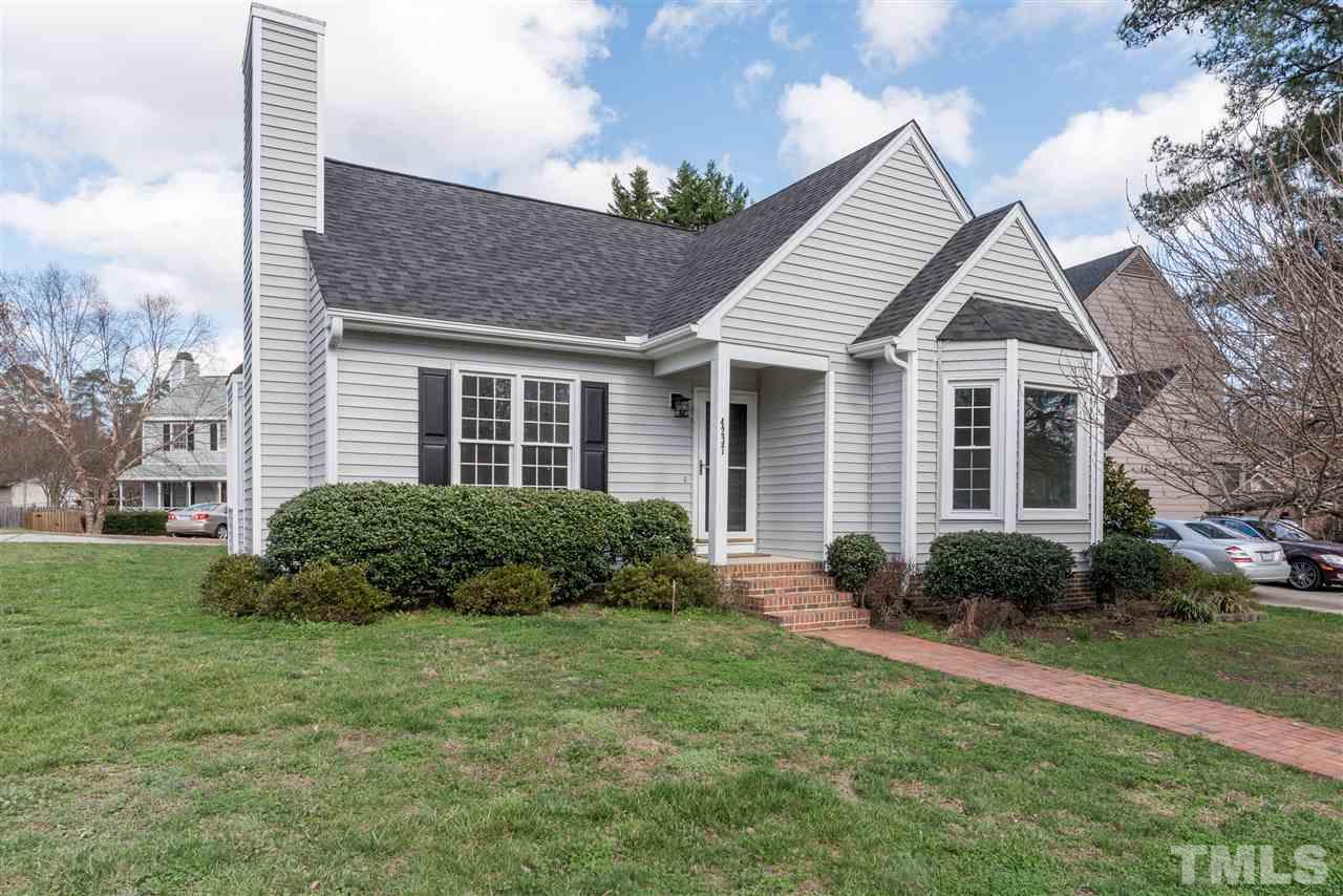 4237 Dinwiddie Court Raleigh, NC 27604 - Photo 2 of 25 a front view of a house with garden