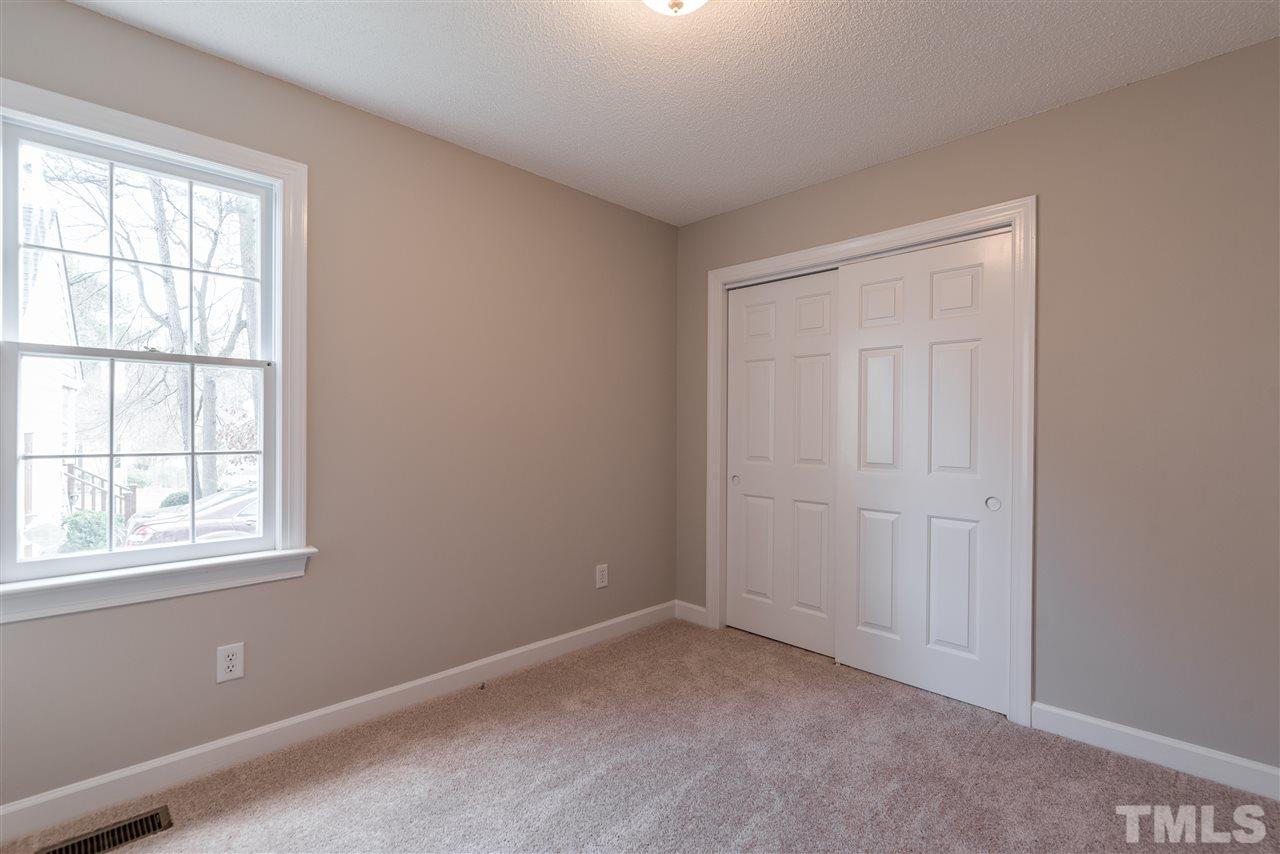 4237 Dinwiddie Court Raleigh, NC 27604 - Photo 20 of 25 an empty room with windows