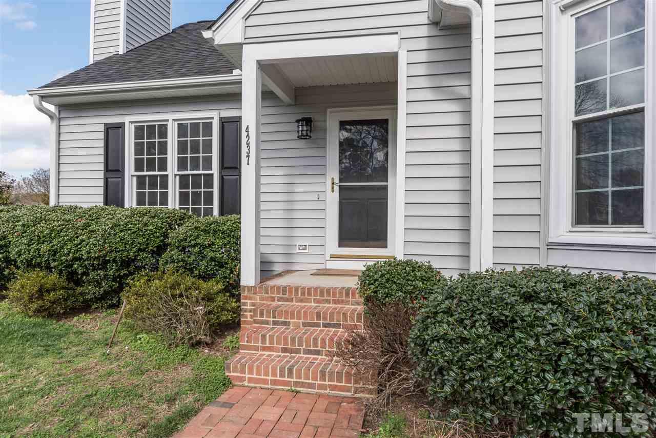 4237 Dinwiddie Court Raleigh, NC 27604 - Photo 3 of 25 a house view with a garden space