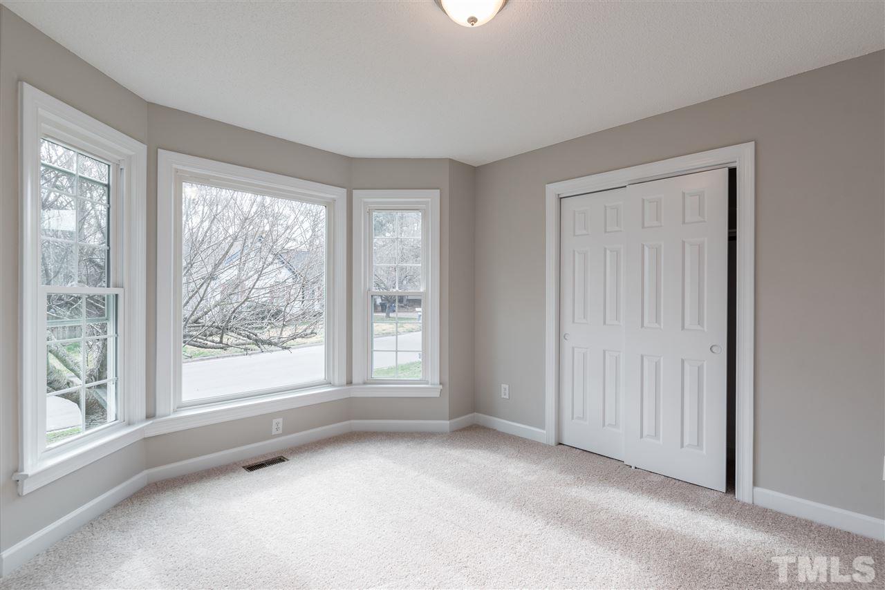 4237 Dinwiddie Court Raleigh, NC 27604 - Photo 21 of 25 an empty room with windows