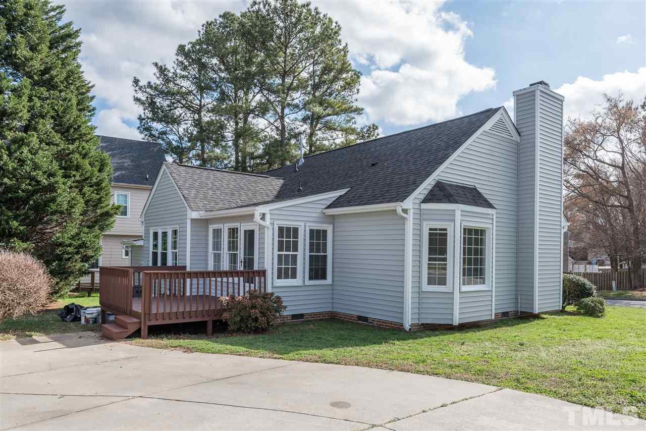 4237 Dinwiddie Court Raleigh, NC 27604 - Photo 23 of 25 a view of backyard with deck and garden