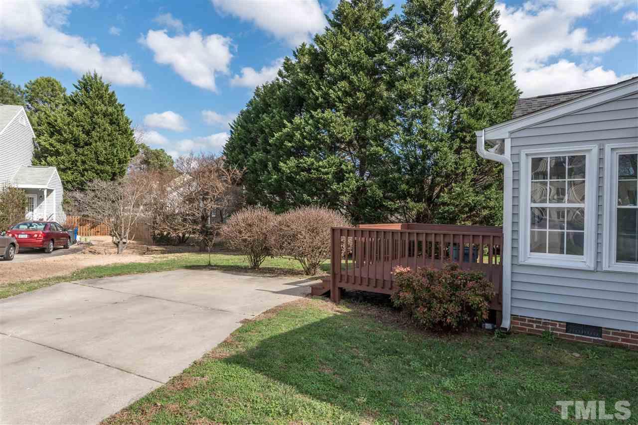4237 Dinwiddie Court Raleigh, NC 27604 - Photo 24 of 25 a view of a house with backyard and sitting area