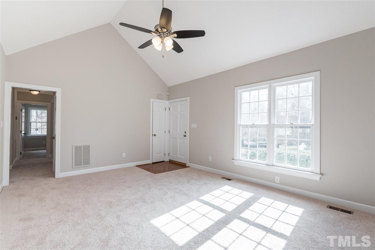 4237 Dinwiddie Court Raleigh, NC 27604 - Photo 6 of 25 a view of an empty room with a window