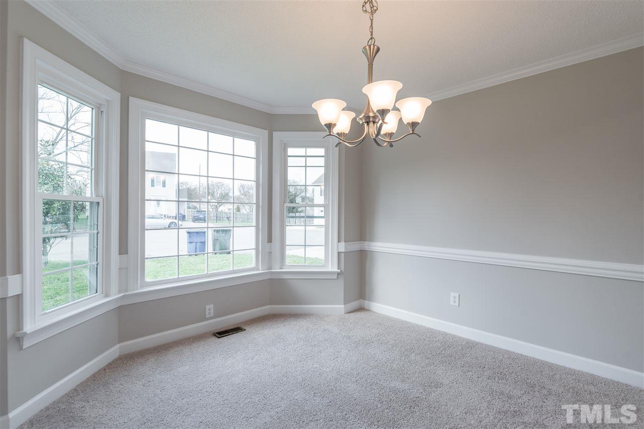 4237 Dinwiddie Court Raleigh, NC 27604 - Photo 9 of 25 a view of an empty room with a window