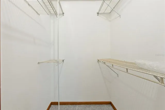 a view of a room with racks on the wall