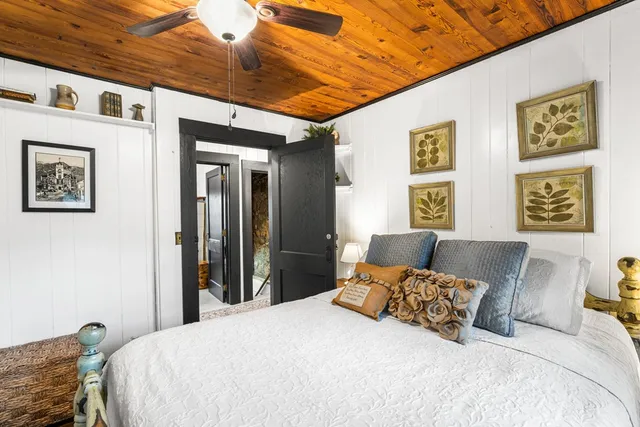 a view of a swimming pool with a yard