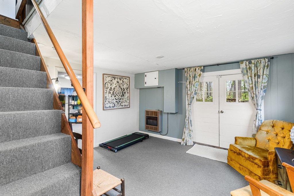 106 Settawig Road Brasstown, NC 28902 - Photo 27 of 100 a view of livingroom with furniture and stairs