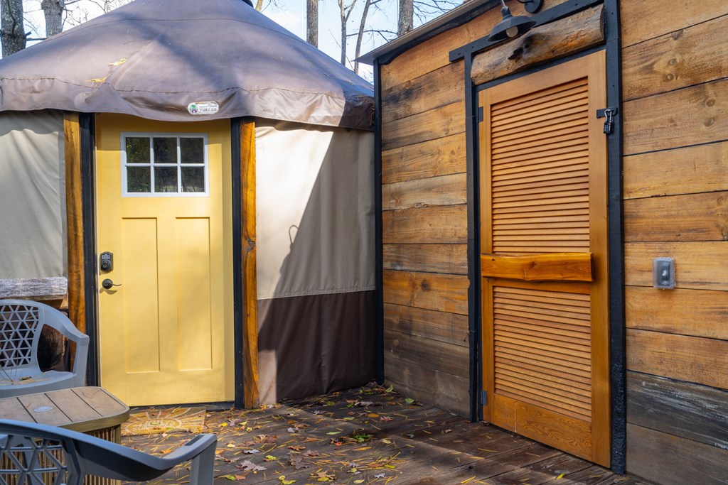 106 Settawig Road Brasstown, NC 28902 - Photo 68 of 100 a view of entryway door of the house