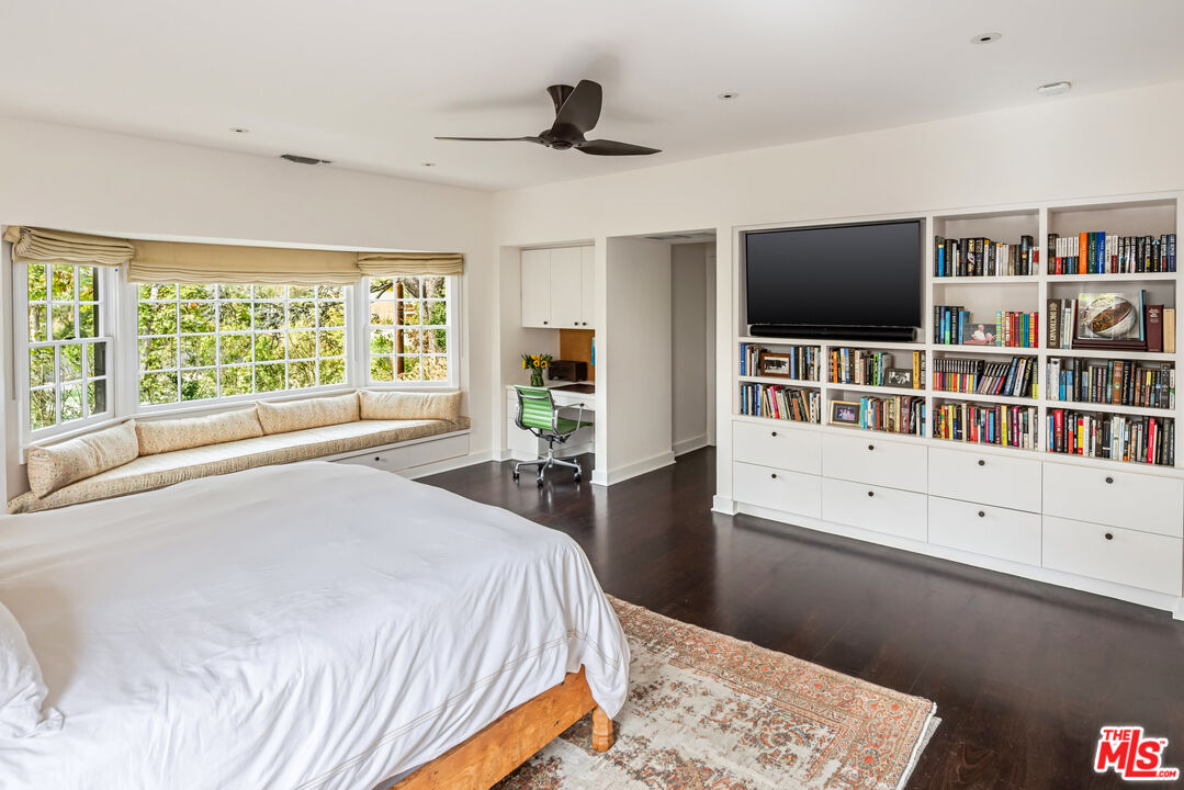 7 Latimer Road Santa Monica, CA 90402 - Photo 16 of 37 a bedroom with furniture and a flat screen tv