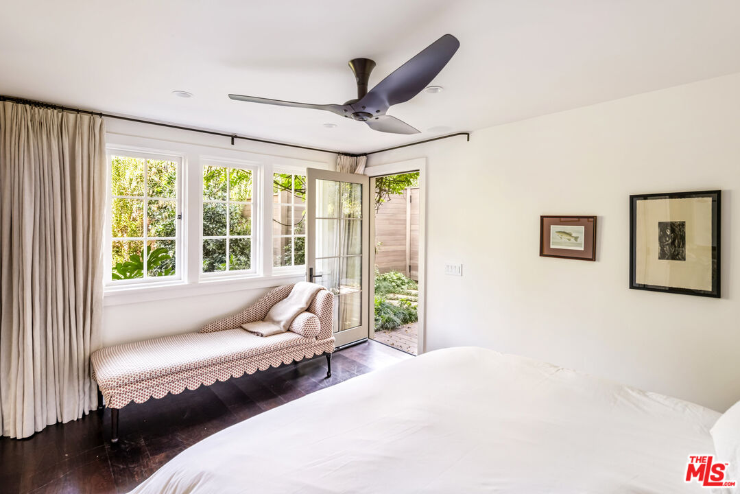 7 Latimer Road Santa Monica, CA 90402 - Photo 33 of 37 a living room with furniture and a large window