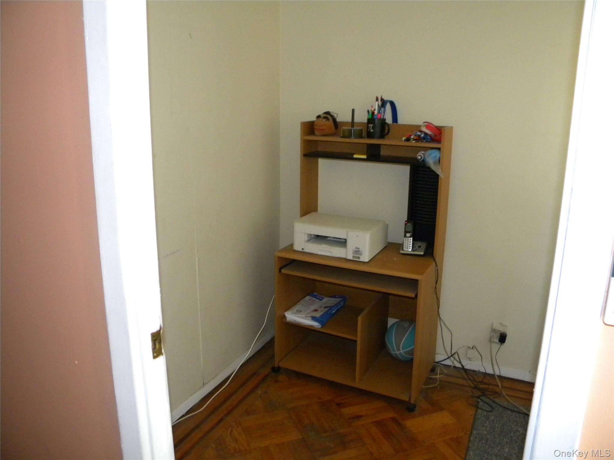 241-26 86th Road Queens, NY 11426 - Photo 14 of 38 a room with storage and utility