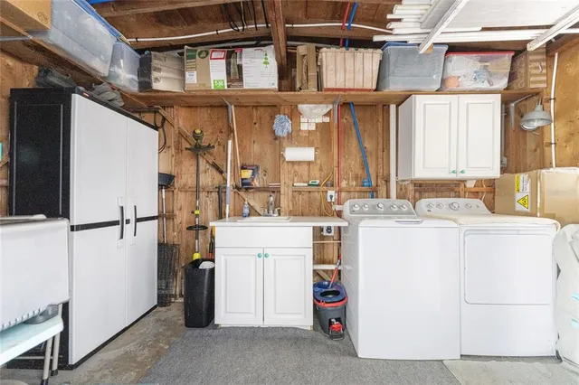 a utility room with dryer and washer