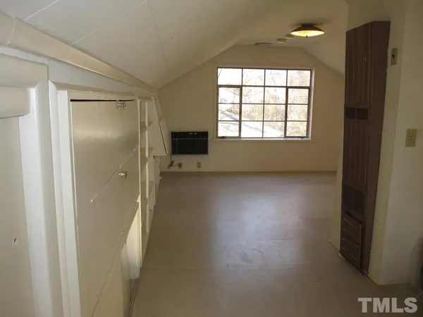 a view of livingroom with hardwood floor and window