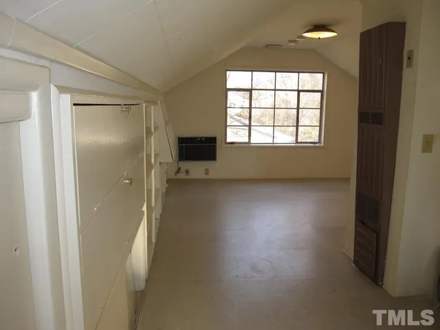 a view of livingroom with hardwood floor and window