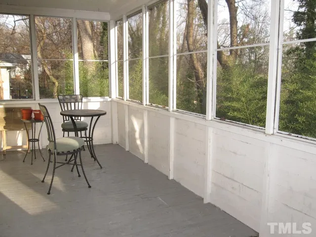 a view of a room with a large window