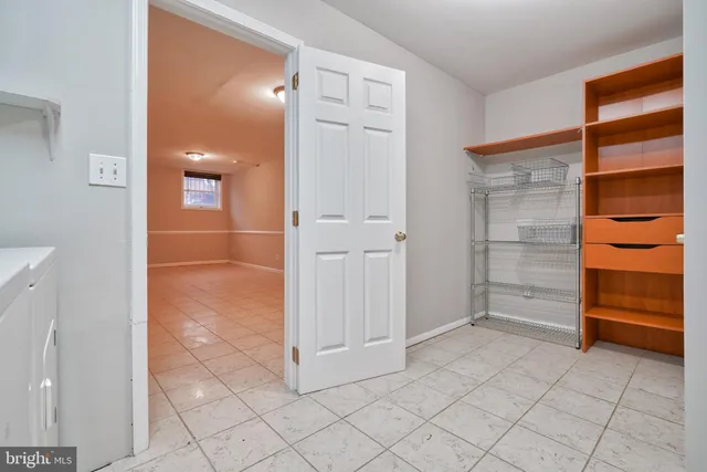 wooden floor to ceiling window and an empty room