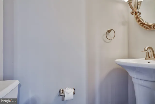 a bathroom with a sink and vanity