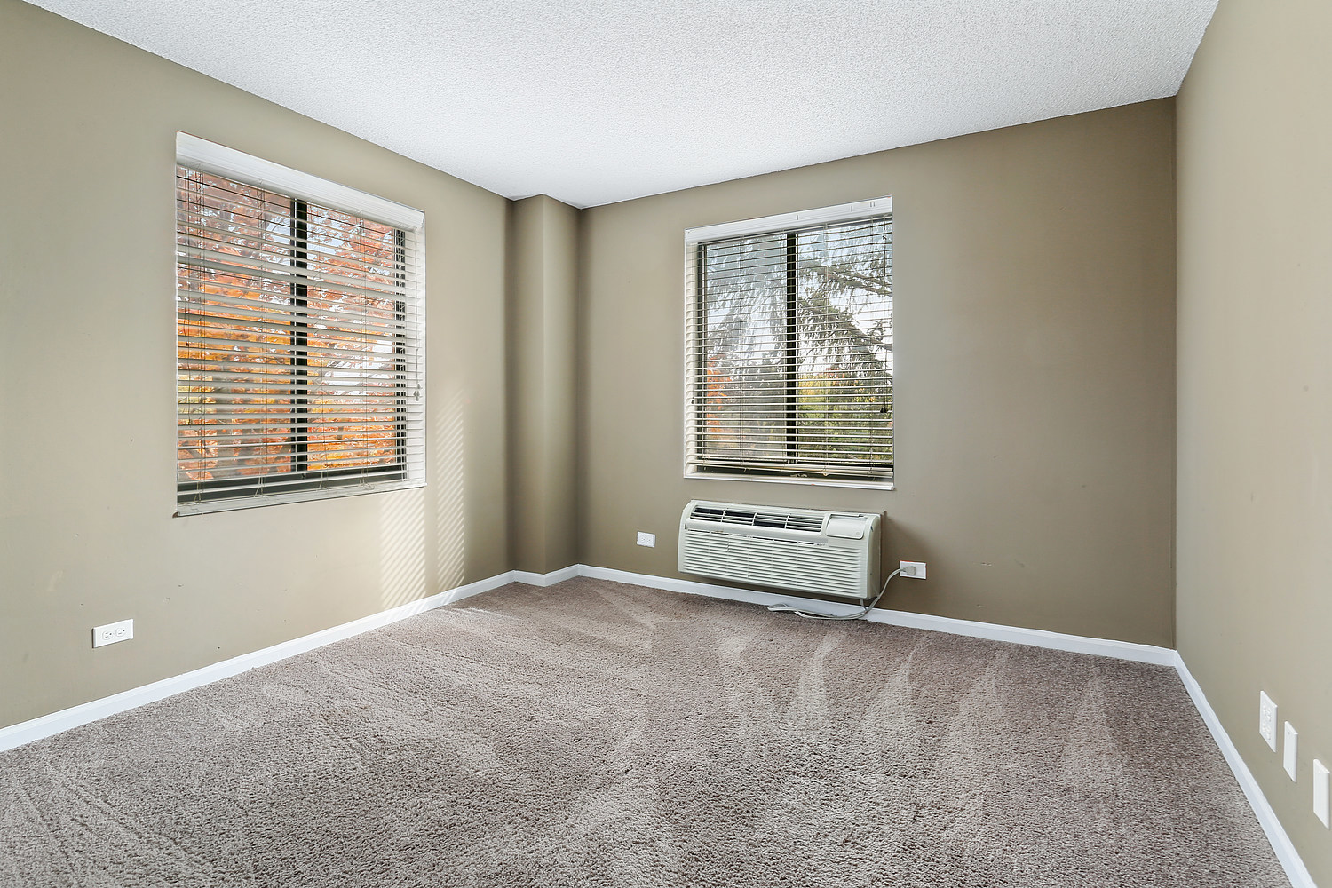 470 Fawell Boulevard, Unit 320 Glen Ellyn, IL 60137 - Photo 10 of 15 a view of an empty room with a window