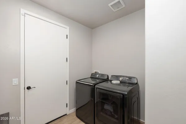 a view of utility room with washer and dryer