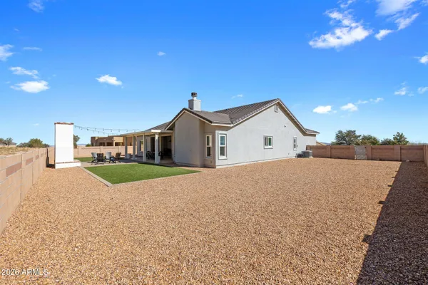 a house view with a outdoor space