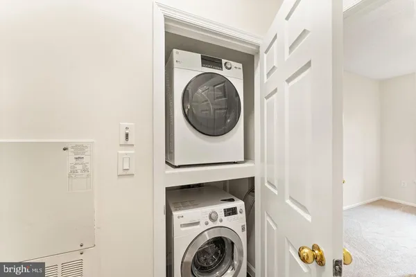 a view of a balcony with wooden floor