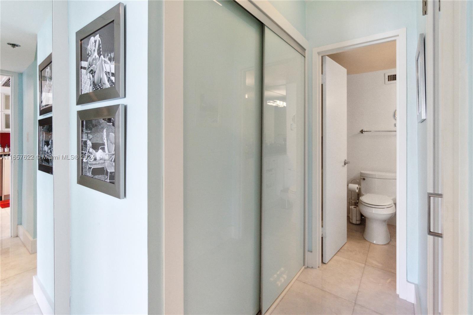 100 Lincoln Road, Unit 1534 Miami Beach, FL 33139 - Photo 10 of 25 a bathroom with a toilet and a shower