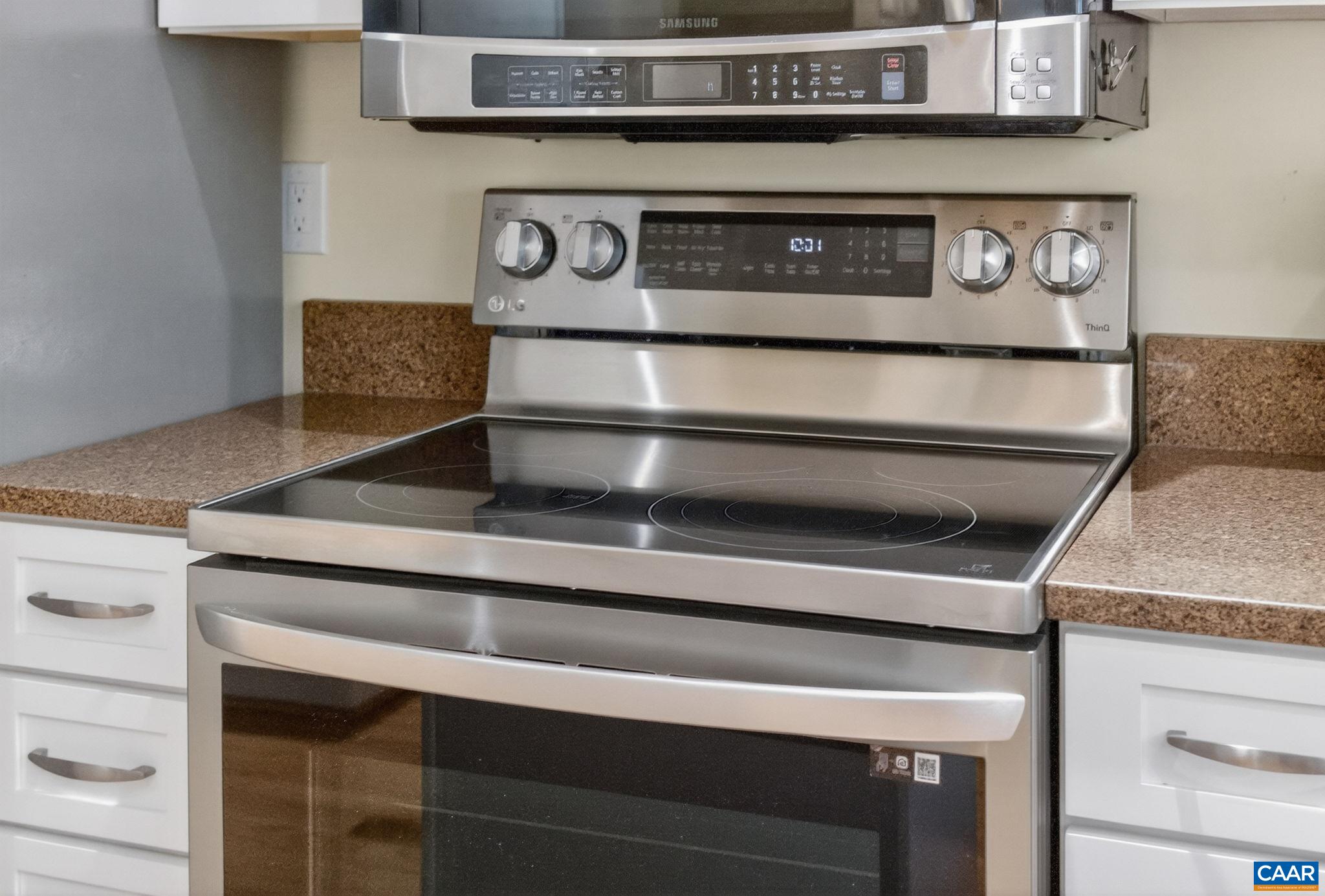 590 Mockingbird Way Charlottesville, VA 22901 - Photo 16 of 43 a stove top oven sitting inside of a kitchen