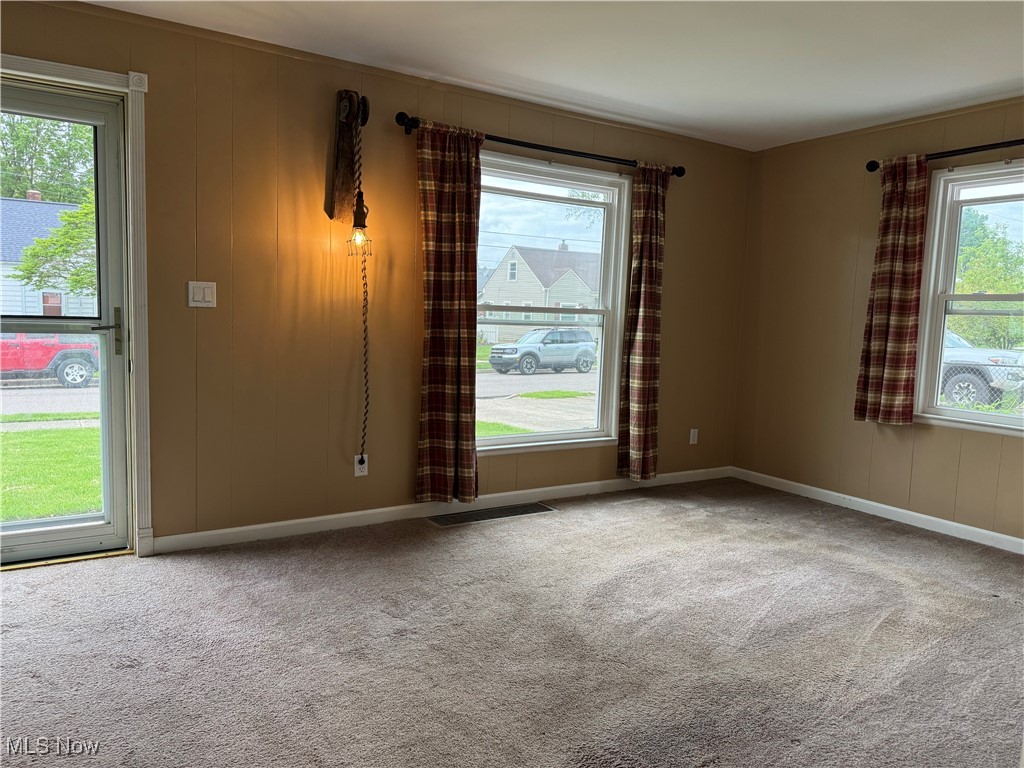 1139 Kessel Avenue Akron, OH 44310 - Photo 23 of 36 Carpeted empty room with baseboards