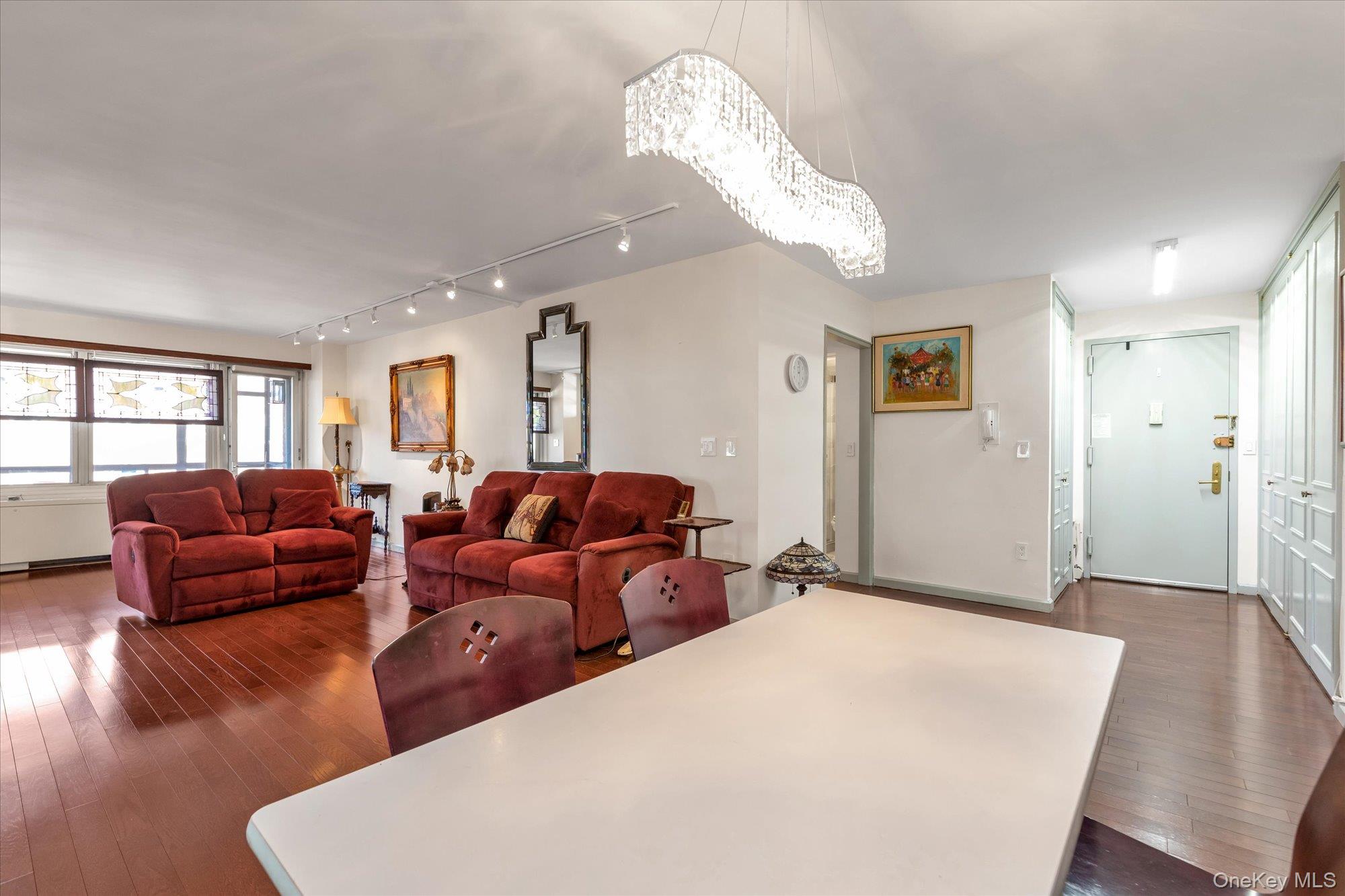 70-20 108th Street, Unit 5P Queens, NY 11375 - Photo 3 of 14 a bed room with bed and window