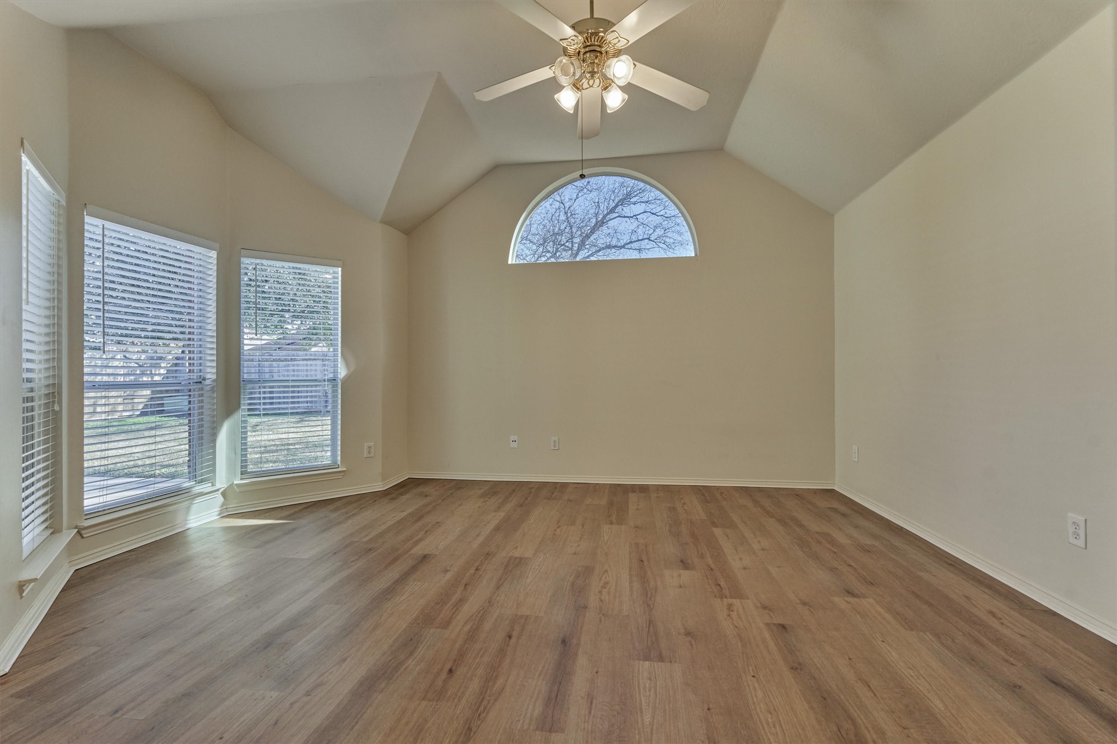21322 Hannover Forest Spring, TX 77388 - Photo 15 of 30 Sprawling primary bedroom has it all with high ceilings and walls of windows overlooking the private backyard.