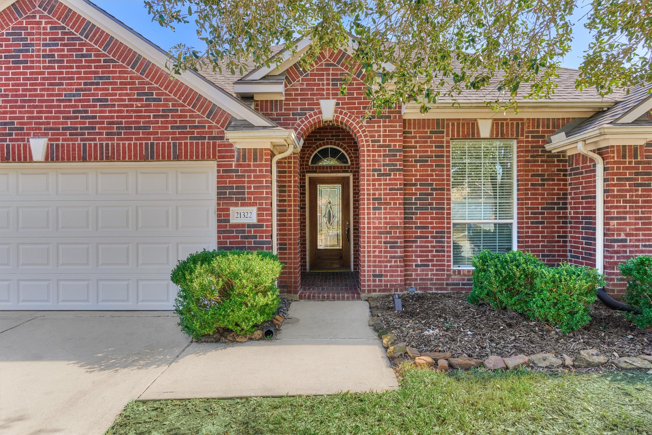 21322 Hannover Forest Spring, TX 77388 - Photo 2 of 30 Charming red brick front exterior with covered porch.