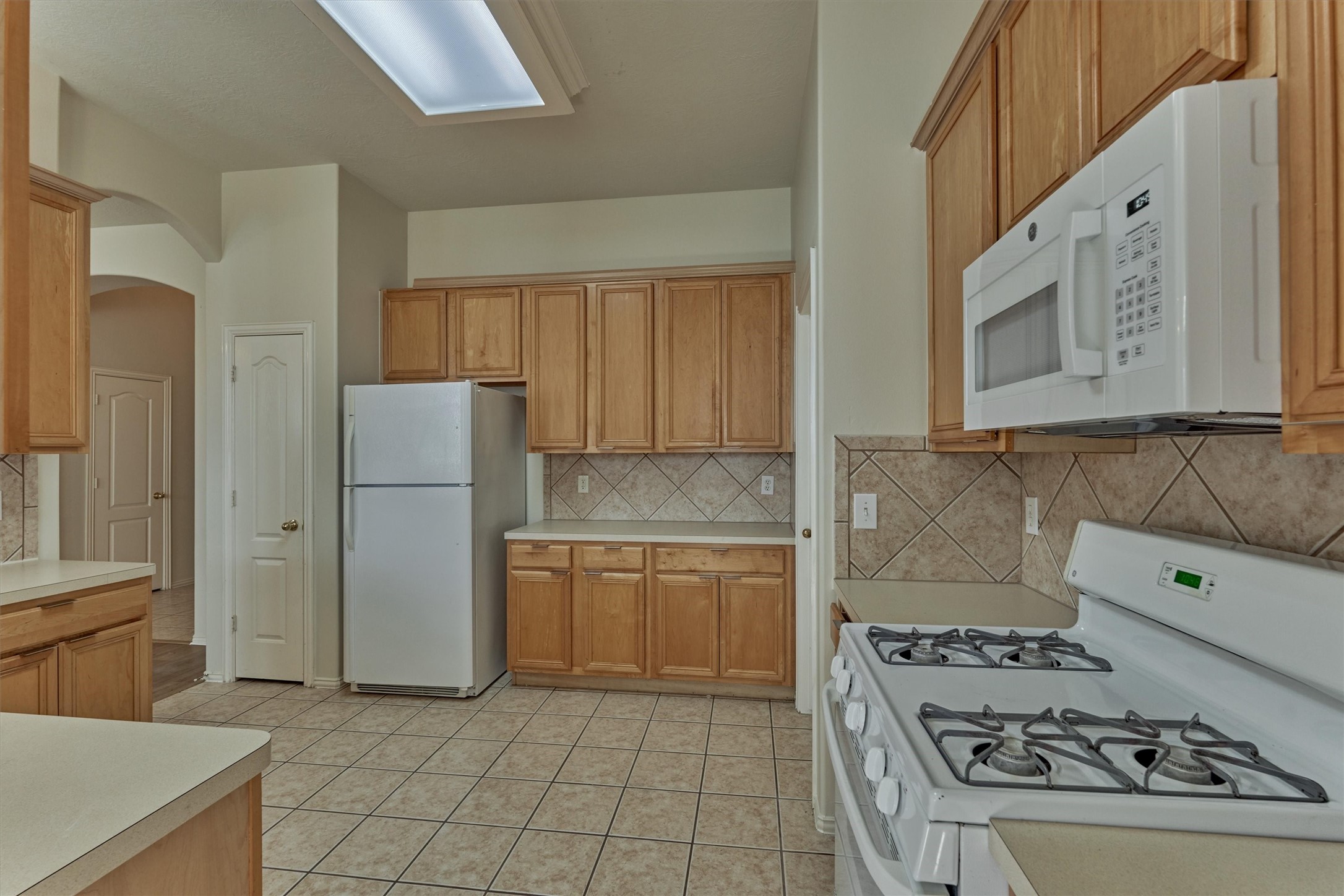 21322 Hannover Forest Spring, TX 77388 - Photo 10 of 30 Chef's kitchen offers ample counter and cabinetry space + pantry!