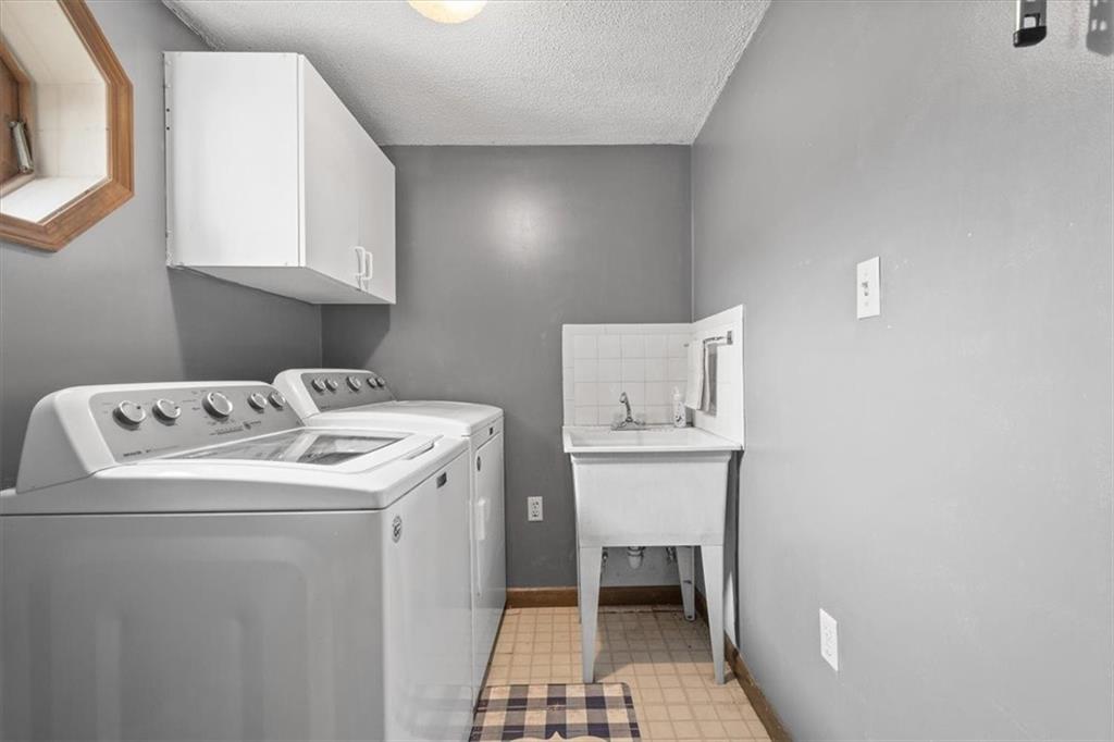 1315 South Main Street Burgettstown, PA 15021 - Photo 12 of 24 a utility room with dryer and washer