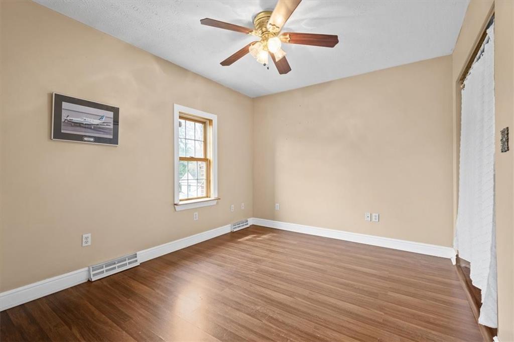 1315 South Main Street Burgettstown, PA 15021 - Photo 20 of 24 a view of a big room with wooden floor and windows
