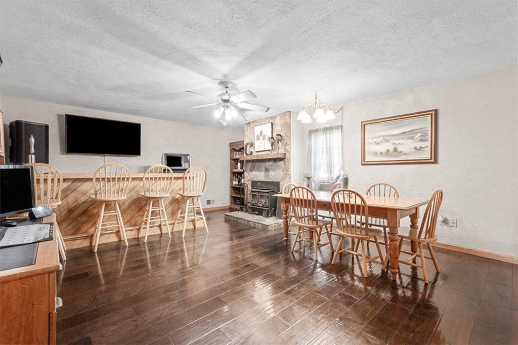 1315 South Main Street Burgettstown, PA 15021 - Photo 7 of 24 a view of a dining room with furniture and wooden floor
