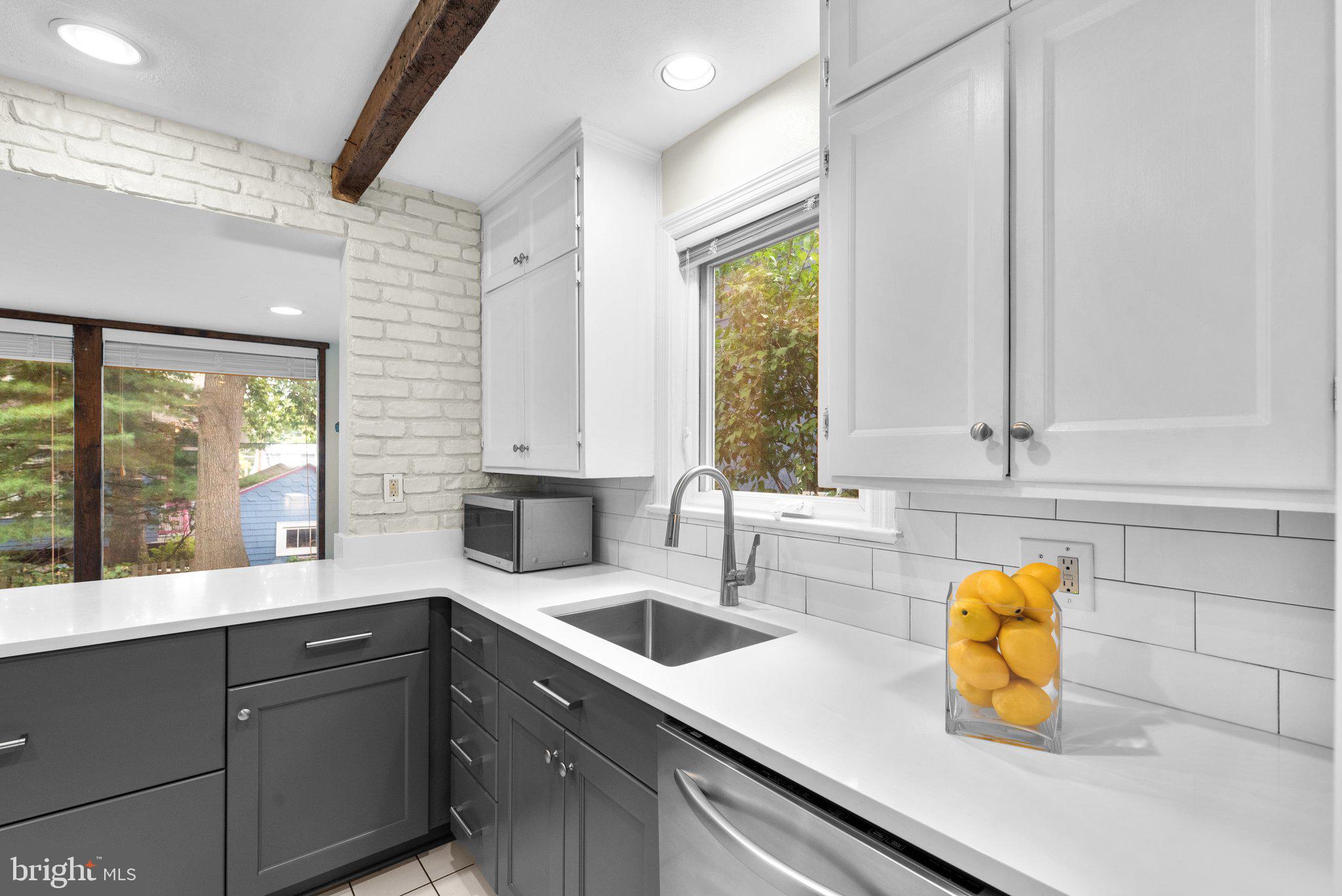 807 Islington Street Silver Spring, MD 20910 - Photo 13 of 49 Renovated Kitchen with tile backspalsh